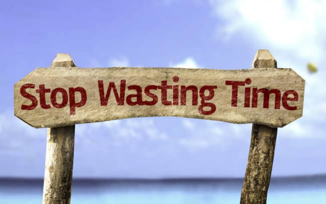stop wasting time sign - 20 ways to procrastinate instead of working