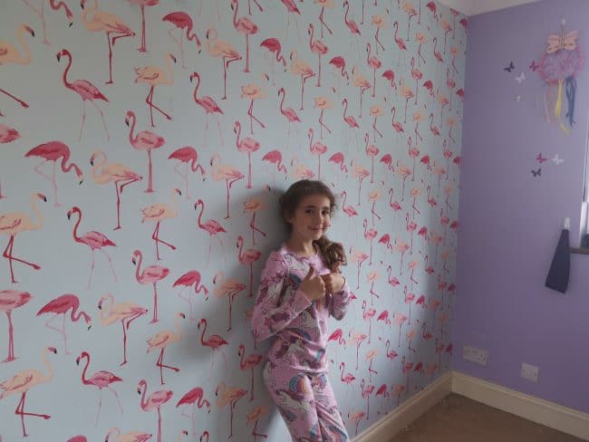 Changing the look of a room with posters and wall art 2 flamingos wallpaper e1560509815906