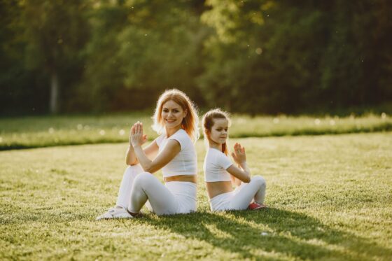 mother and daughter yoga scaled e1654250233203