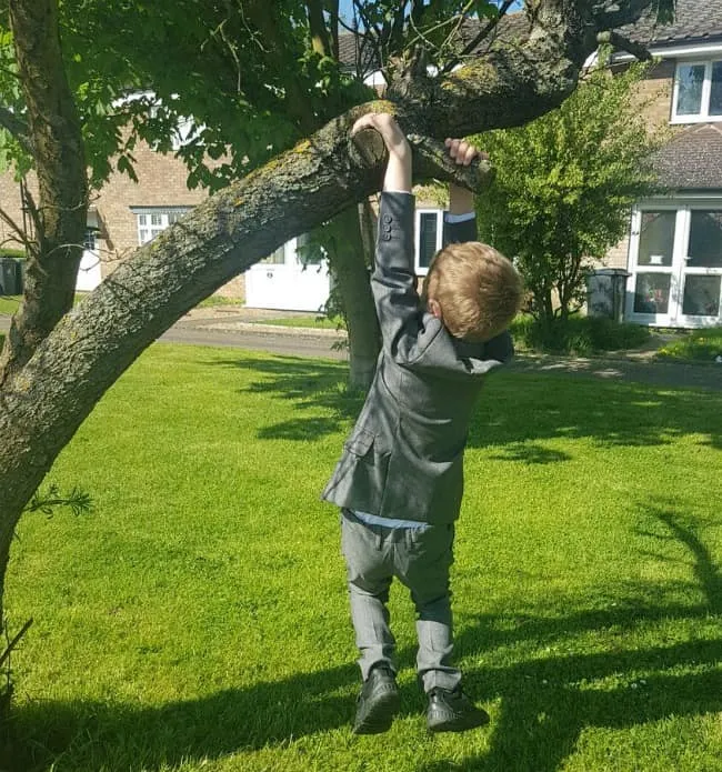 harry hanging around in suit